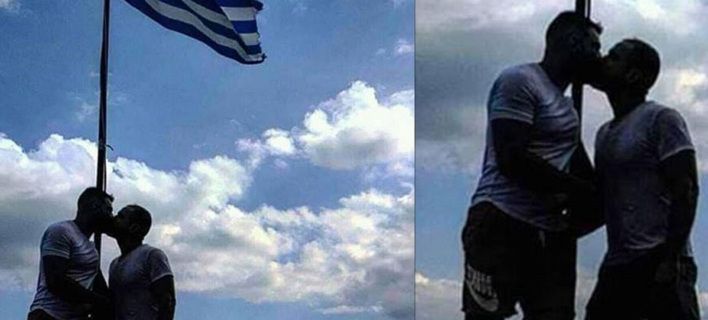 Αξιωματικός της ΕΛ.ΑΣ. γιόρτασε την 28η Οκτωβρίου με ένα φιλί στον σύντροφό του, μπροστά στην ελληνική σημαία
